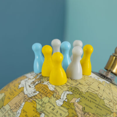 pawns-world-globe-with-blue-background